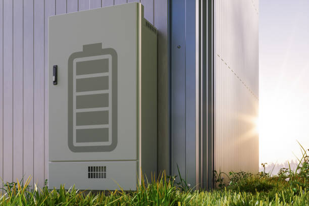 Close-up Of Home Battery Storage System Mounted On Building Facade With Sunlight Background