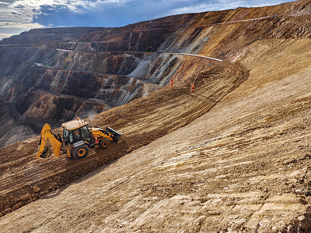 Construction machinery working in open pit mine Construction machinery working in open pit mine